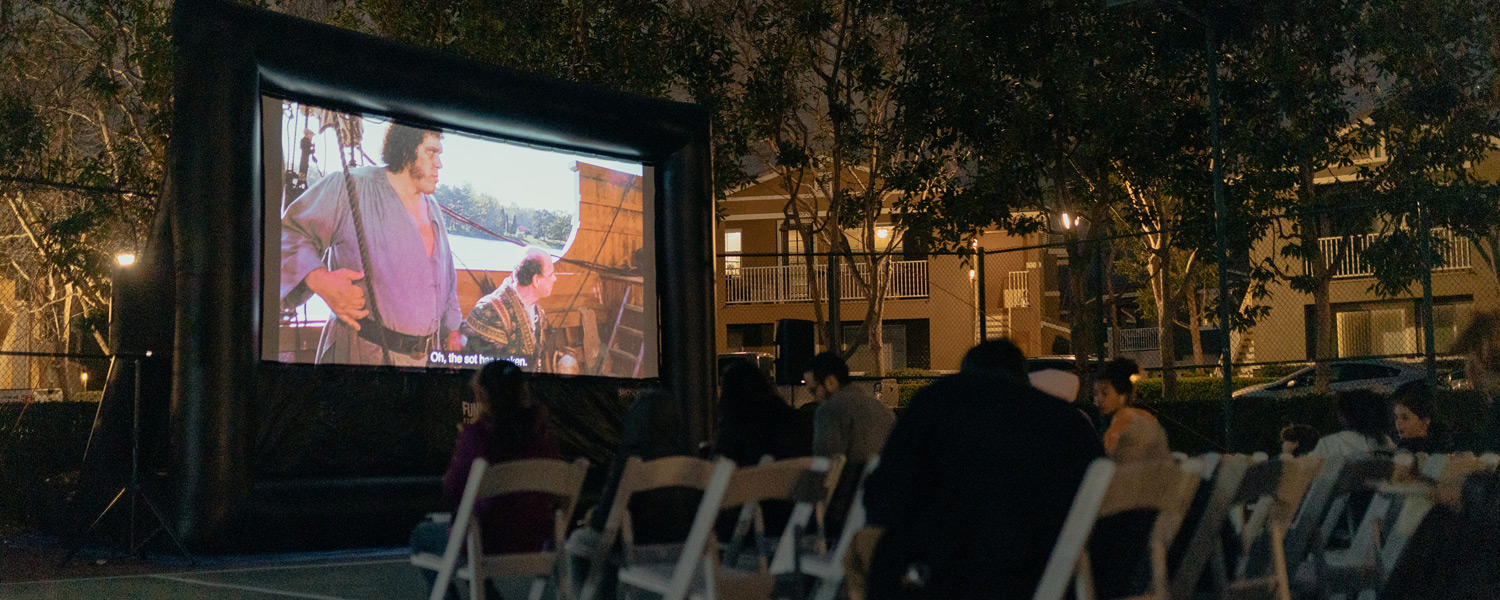 FunFlicks inflatable movie screen at a neighborhood party