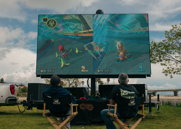 Outdoor video game tournament on a FunFlicks LED screen