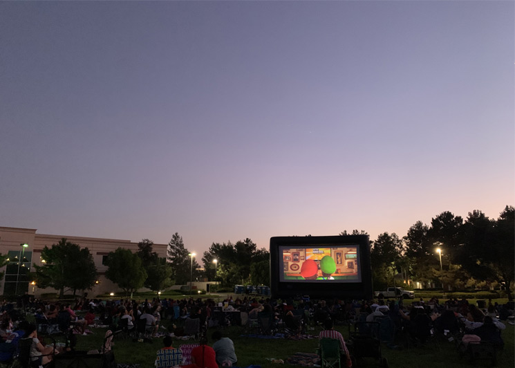 FunFlicks outdoor movie party on a field
