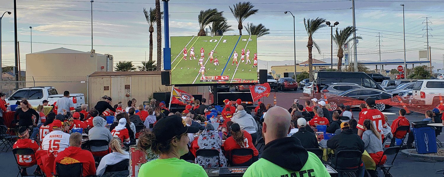 Fans watching the Super Bowl on an LED screen