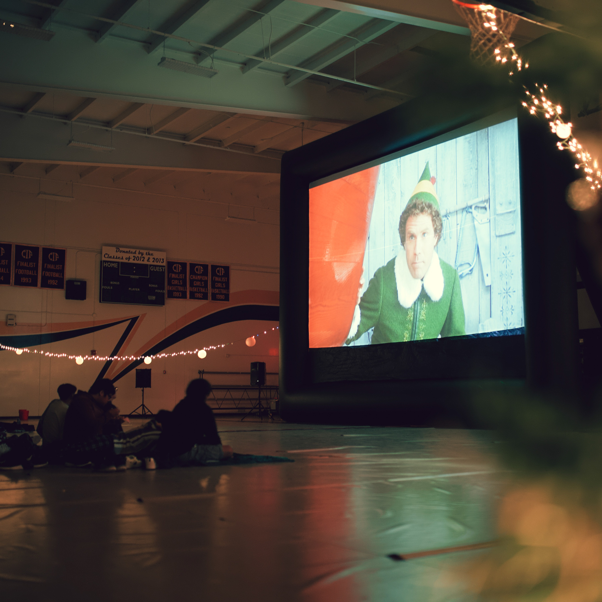 FunFlicks® inflatable screen at a Christmas movie party