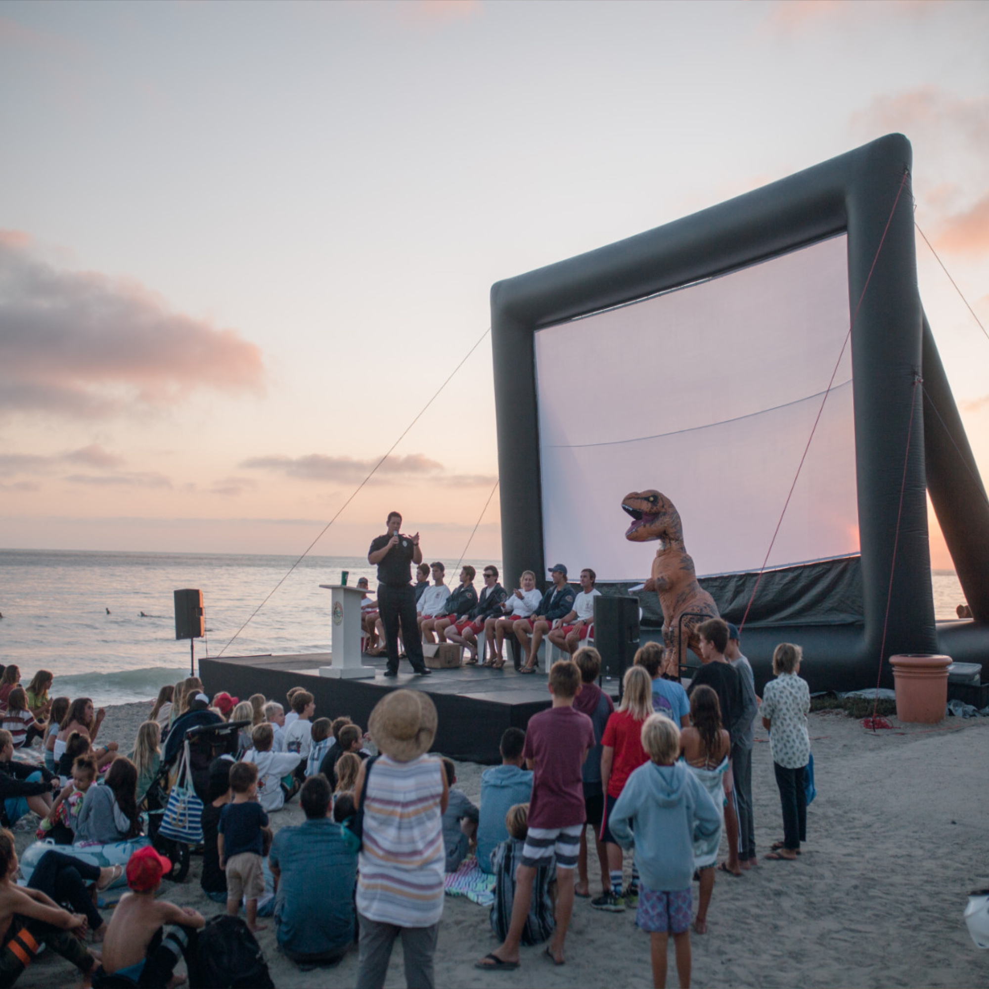 Parks & Rec inflatable movie screen party on the beach