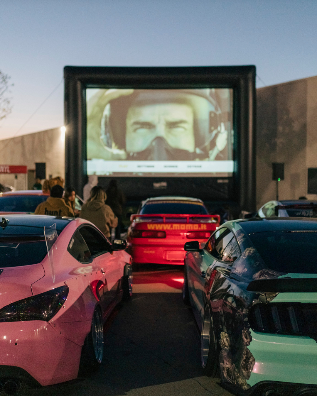 FunFlicks® outdoor movie screen rental drive in at a local car meet