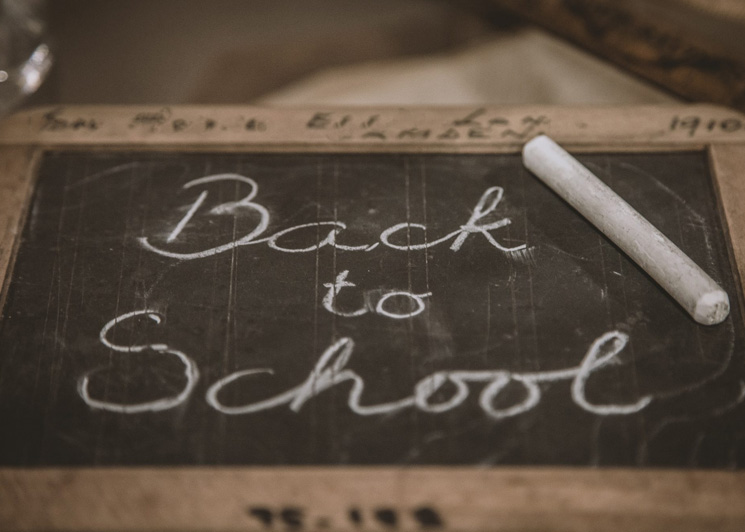Back to school written on a chalk board