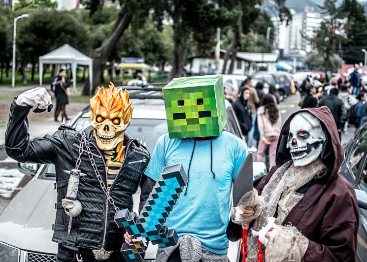 Partygoers dressed up in Minecraft themed costumes